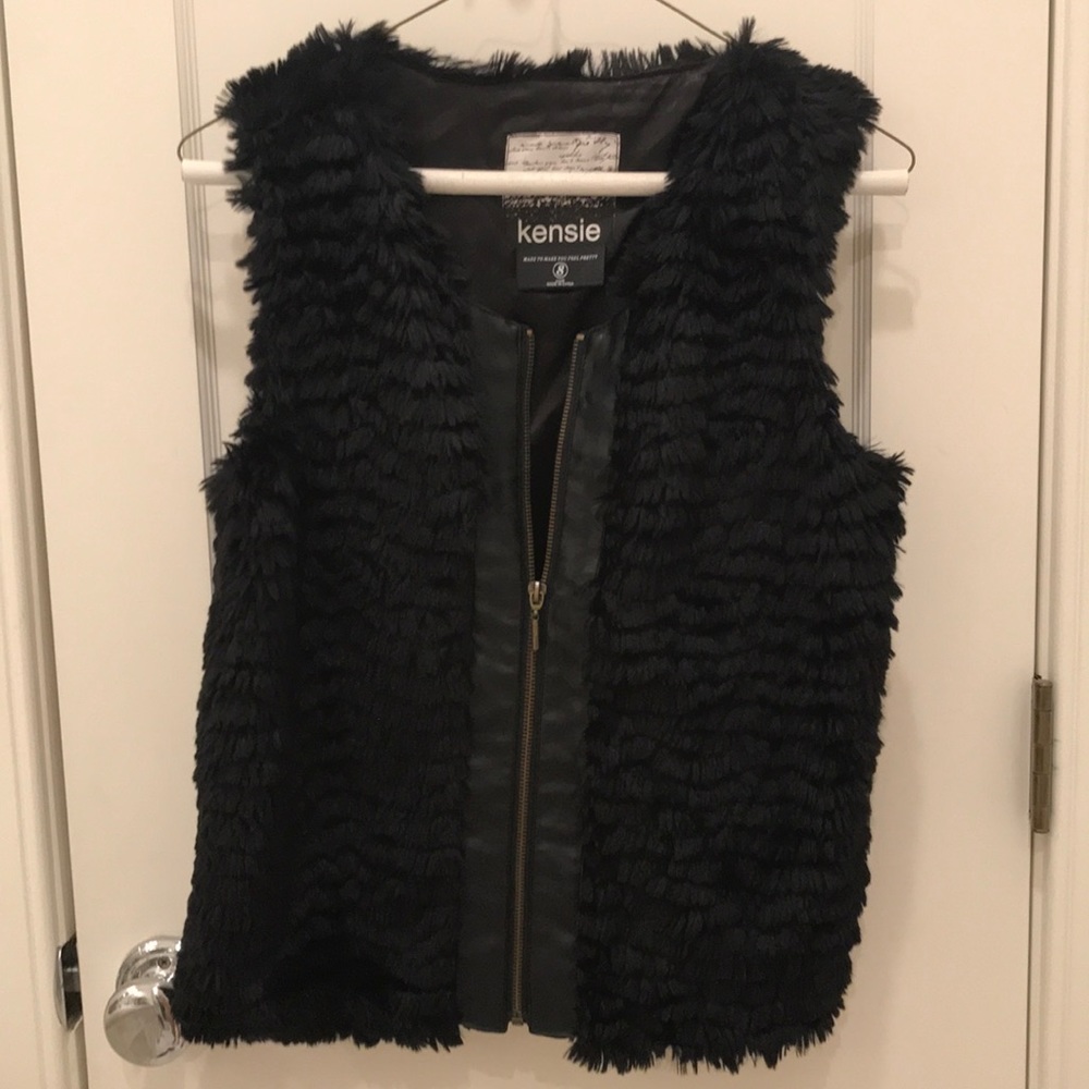 Black fur vest with leather detail